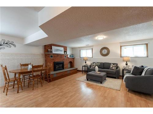 79 Roundhill Court, London, ON - Indoor Photo Showing Living Room With Fireplace
