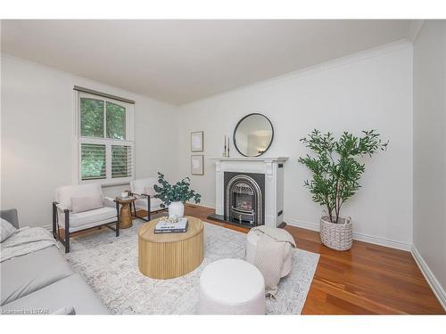 126 Sydenham Street, London, ON - Indoor Photo Showing Living Room With Fireplace