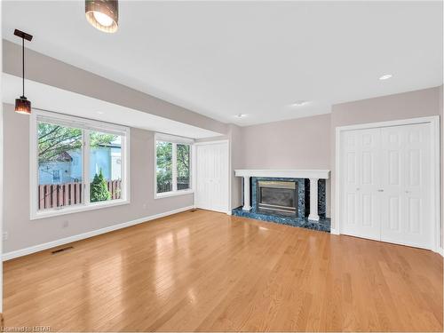 2545 Labelle Street, Windsor, ON - Indoor Photo Showing Living Room With Fireplace