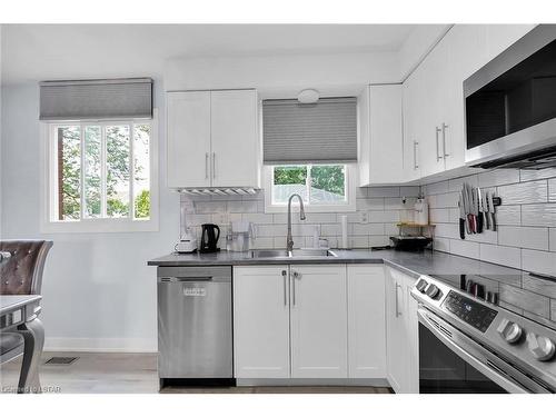 67 Roundhill Court, London, ON - Indoor Photo Showing Kitchen With Double Sink
