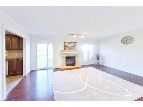 1140 Silverfox Drive, London, ON - Indoor Photo Showing Living Room With Fireplace