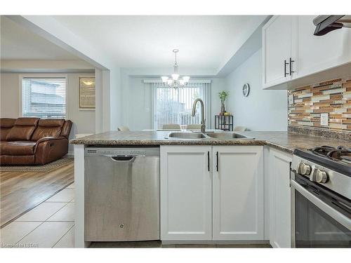 2711 Foxbend Link, London, ON - Indoor Photo Showing Kitchen With Double Sink