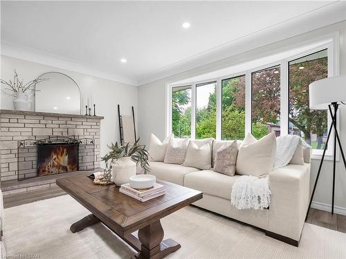 67 Agincourt Gardens, London, ON - Indoor Photo Showing Living Room With Fireplace