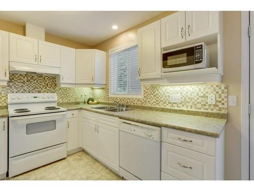 83-1535 Trossacks Avenue, London, ON - Indoor Photo Showing Kitchen With Double Sink
