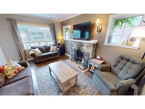 881 Adelaide Street N, London, ON - Indoor Photo Showing Living Room With Fireplace