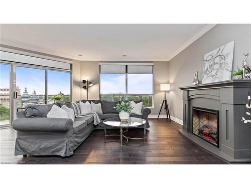 908-250 Pall Mall Street, London, ON - Indoor Photo Showing Living Room With Fireplace