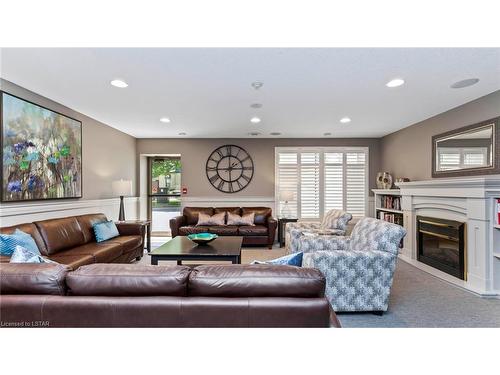 908-250 Pall Mall Street, London, ON - Indoor Photo Showing Living Room With Fireplace