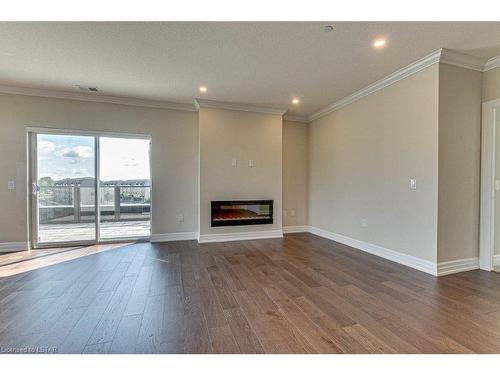 313-480 Callaway Road, London, ON - Indoor Photo Showing Living Room With Fireplace