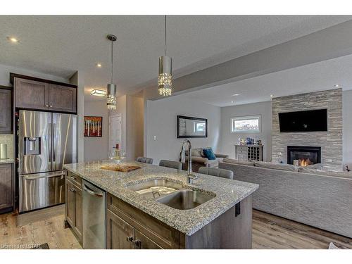 1296 Dyer Crescent, London, ON - Indoor Photo Showing Kitchen With Fireplace With Double Sink With Upgraded Kitchen