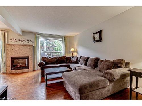 82 Rossmore Court, London, ON - Indoor Photo Showing Living Room With Fireplace