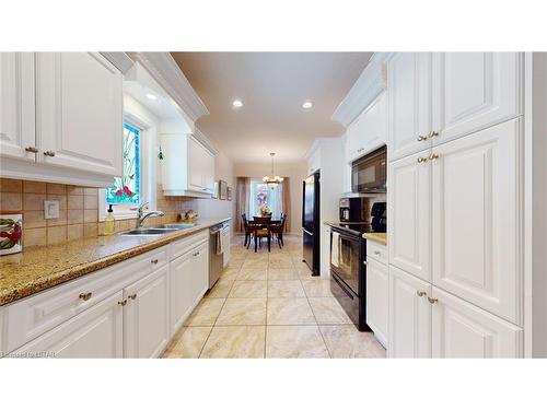 8-1144 Coronation Drive, London, ON - Indoor Photo Showing Kitchen With Double Sink