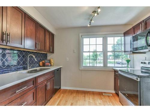 50 Guildwood Walk, London, ON - Indoor Photo Showing Kitchen With Double Sink