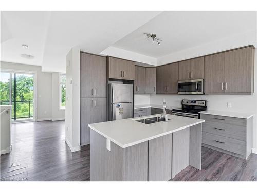 964 West Village Square, London, ON - Indoor Photo Showing Kitchen With Stainless Steel Kitchen With Double Sink