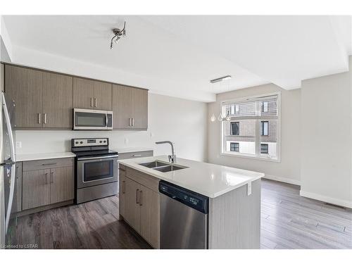964 West Village Square, London, ON - Indoor Photo Showing Kitchen With Stainless Steel Kitchen With Double Sink