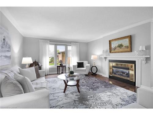 75-50 Fiddlers Green Road, London, ON - Indoor Photo Showing Living Room With Fireplace