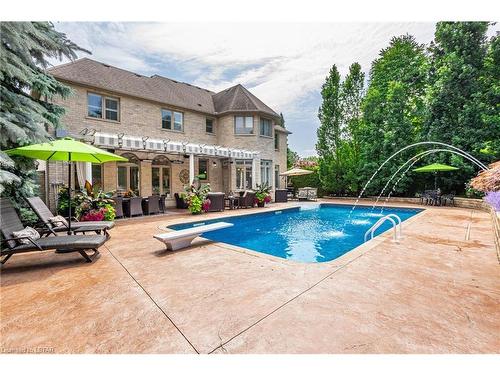 18 Exmoor Place, London, ON - Outdoor With In Ground Pool