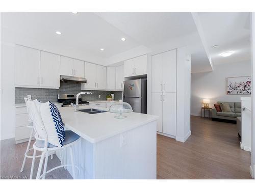 858 West Village Square, London, ON - Indoor Photo Showing Kitchen With Double Sink