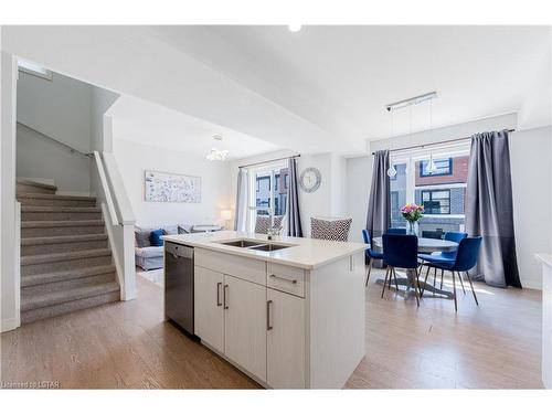 858 West Village Square, London, ON - Indoor Photo Showing Kitchen With Double Sink