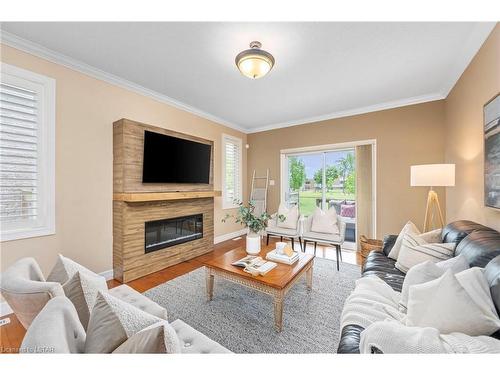 1494 Lawson Road, London, ON - Indoor Photo Showing Living Room With Fireplace