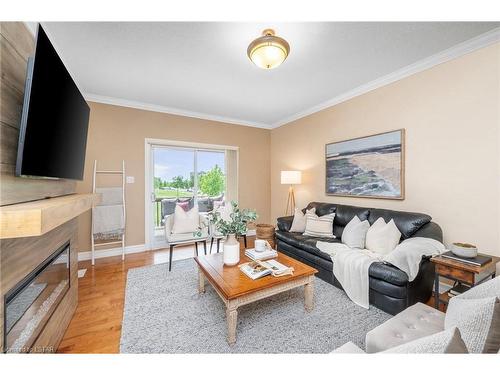 1494 Lawson Road, London, ON - Indoor Photo Showing Living Room With Fireplace