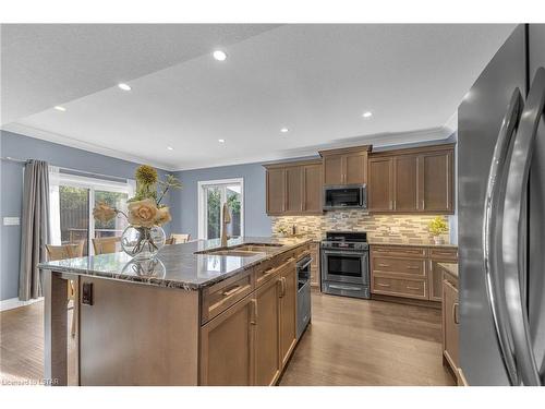 33-41 Earlscourt Terrace, Komoka, ON - Indoor Photo Showing Kitchen With Stainless Steel Kitchen With Double Sink With Upgraded Kitchen