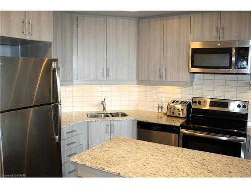 304-560 North Service Road, Grimsby, ON - Indoor Photo Showing Kitchen With Stainless Steel Kitchen With Double Sink With Upgraded Kitchen