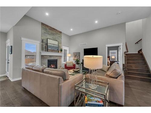 11 Taishan Place, Waterford, ON - Indoor Photo Showing Living Room With Fireplace