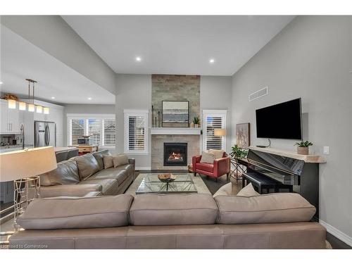 11 Taishan Place, Waterford, ON - Indoor Photo Showing Living Room With Fireplace