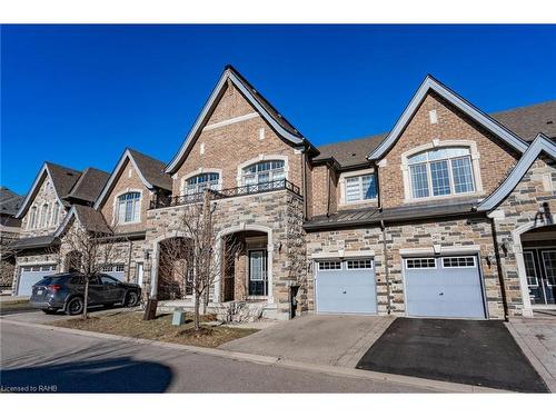 2453 Village Common, Oakville, ON - Outdoor With Facade