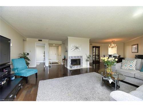 Ph3-150 Wilson Street W, Ancaster, ON - Indoor Photo Showing Living Room With Fireplace