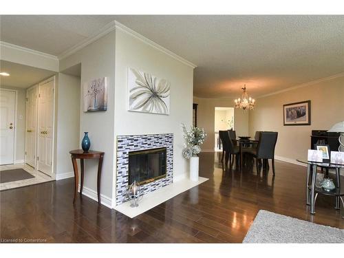 Ph3-150 Wilson Street W, Ancaster, ON - Indoor Photo Showing Living Room With Fireplace