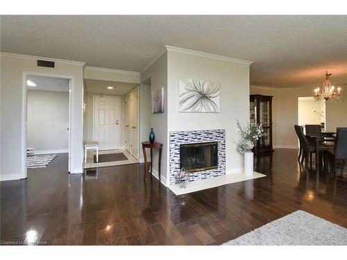 Ph3-150 Wilson Street W, Ancaster, ON - Indoor Photo Showing Living Room With Fireplace