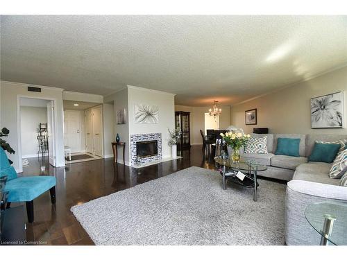 Ph3-150 Wilson Street W, Ancaster, ON - Indoor Photo Showing Living Room With Fireplace