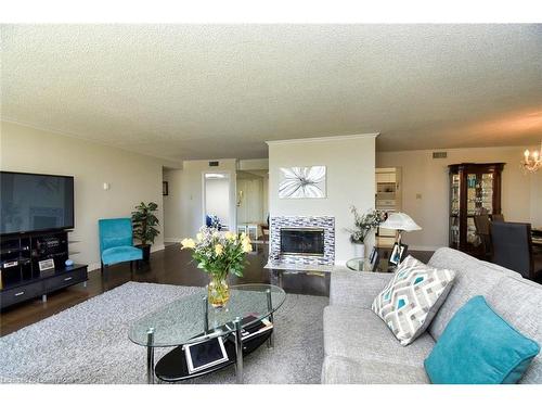 Ph3-150 Wilson Street W, Ancaster, ON - Indoor Photo Showing Living Room With Fireplace