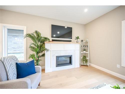 88 St. Michael'S Street, Delhi, ON - Indoor Photo Showing Living Room With Fireplace