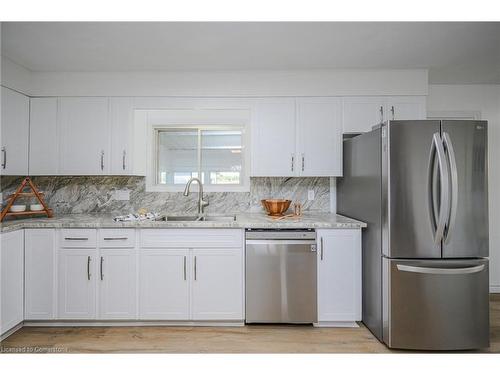 44 Old Cut Boulevard, Long Point, ON - Indoor Photo Showing Kitchen With Double Sink