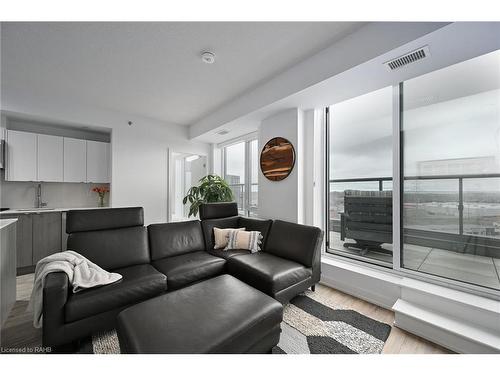 A907-3210 Dakota Common, Burlington, ON - Indoor Photo Showing Living Room