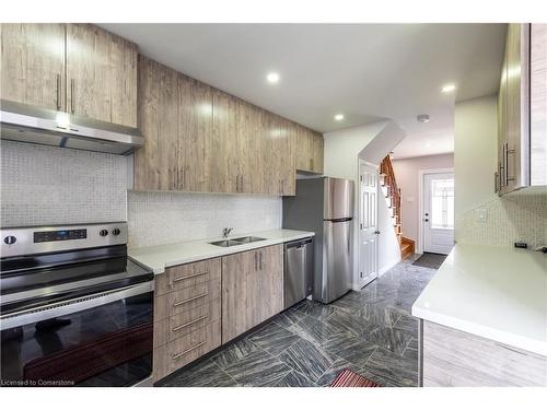 49 Cameron Avenue N, Hamilton, ON - Indoor Photo Showing Kitchen With Stainless Steel Kitchen With Double Sink