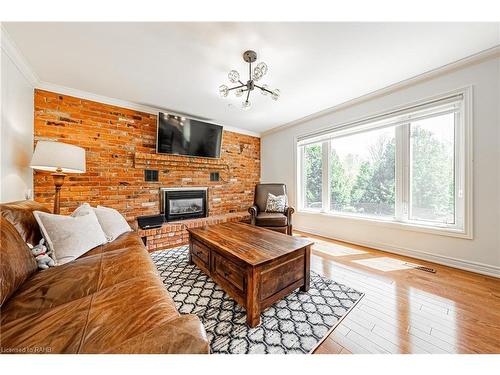 6 Iris Court, Carlisle, ON - Indoor Photo Showing Living Room With Fireplace