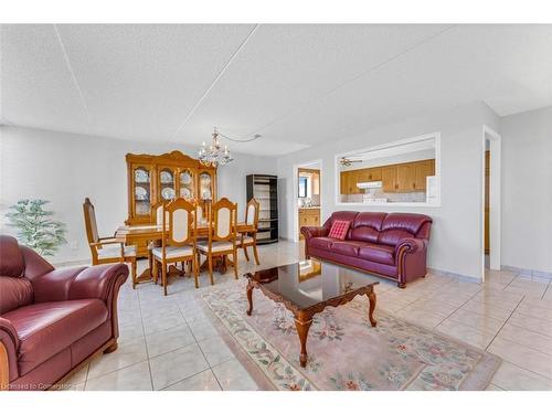 208-99 Donn Avenue, Hamilton, ON - Indoor Photo Showing Living Room