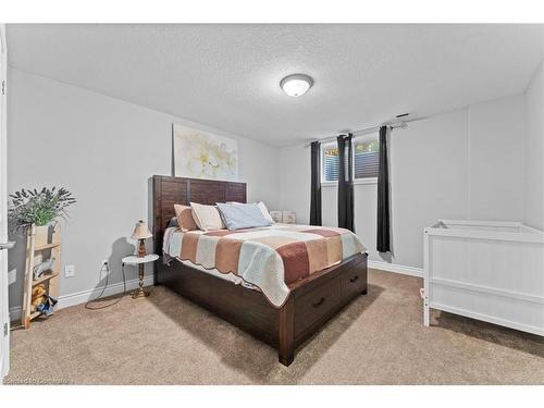 13-418 Nelson Street, Norfolk, ON - Indoor Photo Showing Bedroom