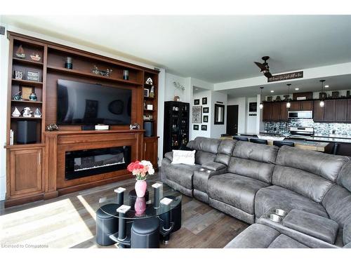 303-38 Harbour Street, Port Dover, ON - Indoor Photo Showing Living Room With Fireplace