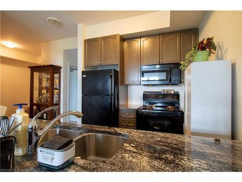 230-5010 Corporate Drive, Burlington, ON - Indoor Photo Showing Kitchen With Double Sink