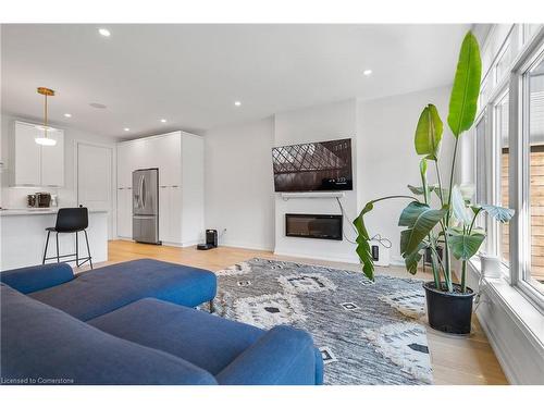 36-8974 Willoughby Drive, Niagara Falls, ON - Indoor Photo Showing Living Room With Fireplace