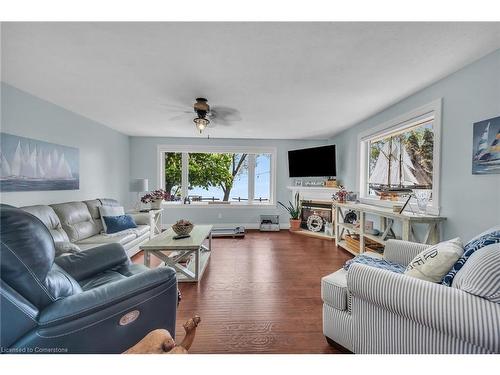 864 South Coast Drive, Peacock Point, ON - Indoor Photo Showing Living Room With Fireplace