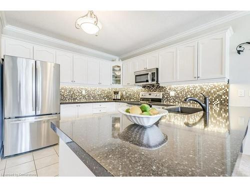 409-1998 Ironstone Drive, Burlington, ON - Indoor Photo Showing Kitchen With Upgraded Kitchen