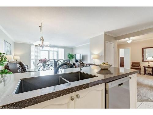 409-1998 Ironstone Drive, Burlington, ON - Indoor Photo Showing Kitchen With Double Sink