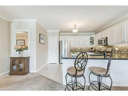 409-1998 Ironstone Drive, Burlington, ON - Indoor Photo Showing Kitchen