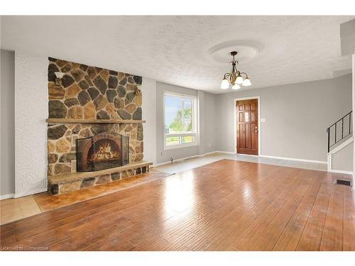 468 Mud Street W, Grassie, ON - Indoor Photo Showing Living Room With Fireplace