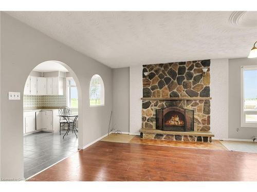 468 Mud Street W, Grassie, ON - Indoor Photo Showing Living Room With Fireplace